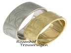 De stille kracht van de zen man of vrouw, lijken deze trouwringen van wit of geelgoud uit te dragen. De kracht ervan wordt extra benadrukt door de breedte van 8 mm. In de dames trouwring zijn verspreid 5 briljant geslepen diamanten van in totaal 0,05 ct. geplaatst.
