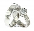 <p><span>Dit schitterende trouwringenpaar is uitgevoerd in witgoud en vooral de ring voor de bruid is zeer exclusief! Deze trouwringen zijn geheel stralend door de gepolijste finish en al die diamanten. Want zoals jullie waarschijnlijk direct is opgevallen, bestaat de damesring bijna geheel uit diamanten. En dan in combinatei met die neutrale herenring staat dit perfect bij elkaar!</span></p> 4843-4844-5