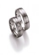 Palladium trouwringen van 5,5 mm breedte met 1 briljant geslepen diamant van 0.07 ct.