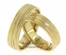 <p>Deze mooie trouwringen zijn uitgevoerd in mat geelgoud in een breedte van 5,7 mm. De ringen hebben een mooie, rustgevende uitstraling. In de dames ring is een briljant geslepen diamant gezet van 0,04 ct. Deze ringen zijn leverbaar in 9, 14 en 18 karaat goud.</p> 7817-7818
